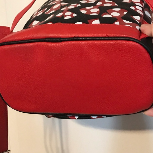A beautiful Mini Disney Backpack with one packet outside. - Picture 4 of 9